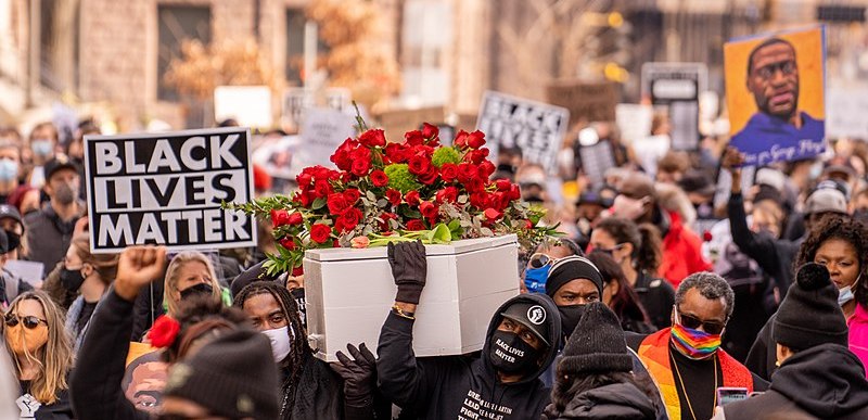 Thousands march the day before the start of jury selection in the Derek Chauvin murder trial. Photo credit: Chad Davis | Wikimedia Commons